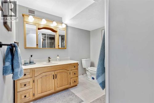 Bath Lower - 7 Mountain Park Circle Se, Calgary, AB - Indoor Photo Showing Bathroom