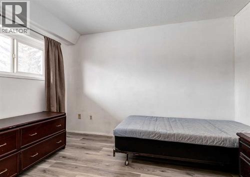 7634 & 7636 22A Street Se, Calgary, AB - Indoor Photo Showing Bedroom
