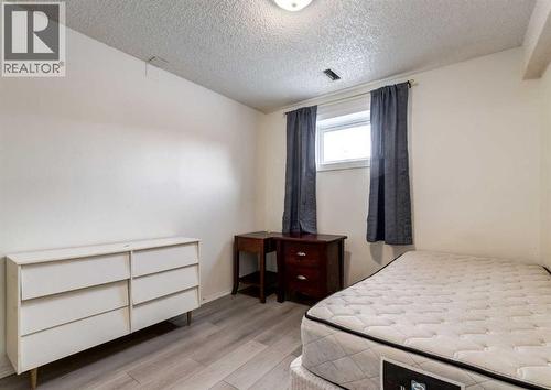 7634 & 7636 22A Street Se, Calgary, AB - Indoor Photo Showing Bedroom