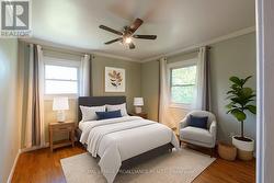 Primary Bedroom with Wood Floors - 