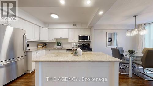 119 - 60 Southport Street N, Toronto, ON - Indoor Photo Showing Kitchen