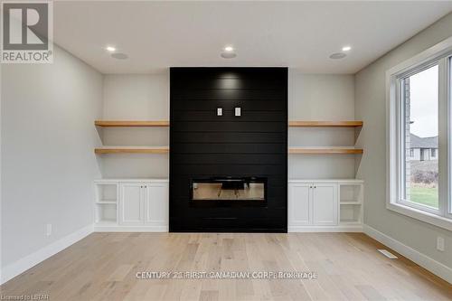 129 Aspen Circle, Thames Centre (Thorndale), ON - Indoor With Fireplace