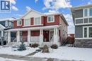 173 Willow Green, Cochrane, AB  - Outdoor With Deck Patio Veranda With Facade 