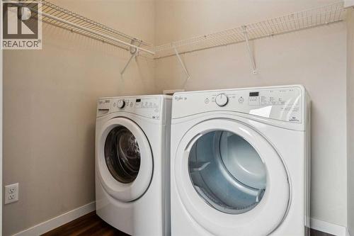 173 Willow Green, Cochrane, AB - Indoor Photo Showing Laundry Room
