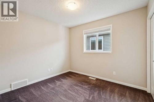 173 Willow Green, Cochrane, AB - Indoor Photo Showing Other Room