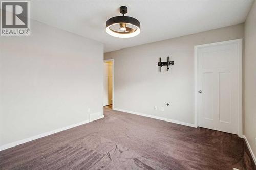 173 Willow Green, Cochrane, AB - Indoor Photo Showing Other Room