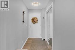 Front entry with modern lighting and lots of closet space - 