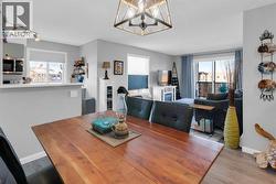 Windows on two walls flood loads of natural light into this space - 