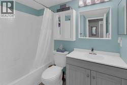 4 piece bath with overjohn cabinetry and comfort height toilet - 