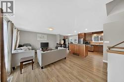 Open concept living room, dining and kitchen - 