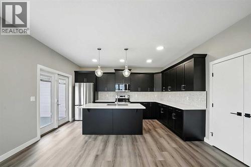 25 Murphy Close, Blackfalds, AB - Indoor Photo Showing Kitchen With Upgraded Kitchen