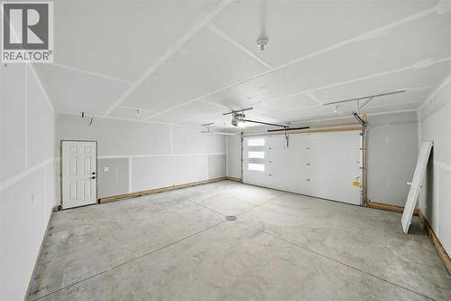 25 Murphy Close, Blackfalds, AB - Indoor Photo Showing Garage