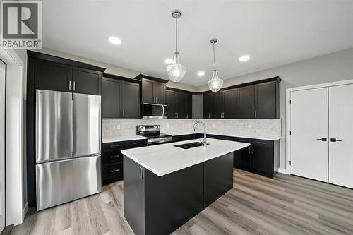 25 Murphy Close, Blackfalds, AB - Indoor Photo Showing Kitchen With Upgraded Kitchen
