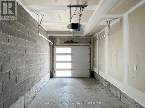 206 - 2550 Castlegate Crossing, Pickering, ON - Indoor Photo Showing Garage