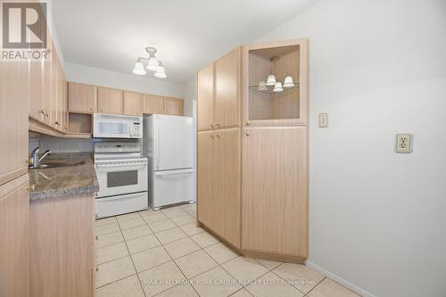 112 - 50 Baif Boulevard, Richmond Hill, ON - Indoor Photo Showing Kitchen With Double Sink