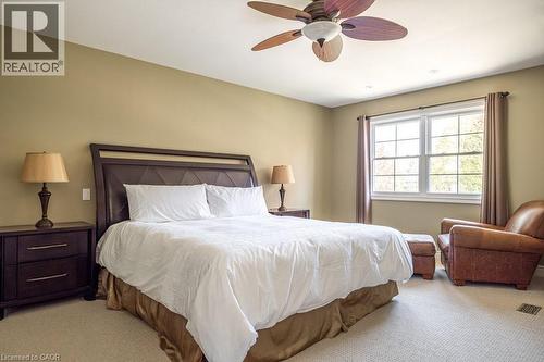 Bedroom with light colored carpet and ceiling fan - 330 Strathcona Drive, Burlington, ON - Indoor Photo Showing Bedroom