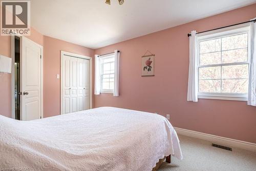 Bedroom with carpet flooring, baseboards, and a closet - 330 Strathcona Drive, Burlington, ON - Indoor Photo Showing Bedroom