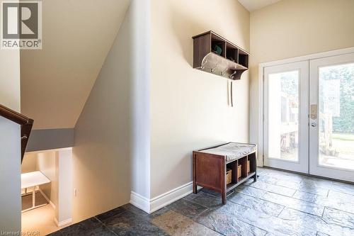 Mudroom with french doors, stone tile flooring, and baseboards - 330 Strathcona Drive, Burlington, ON - Indoor Photo Showing Other Room