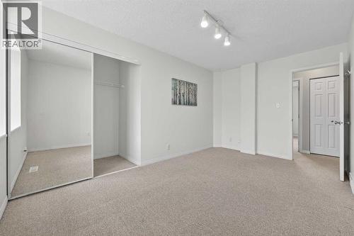 115, 4810 40 Avenue Sw, Calgary, AB - Indoor Photo Showing Other Room
