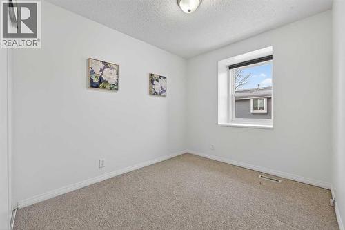 115, 4810 40 Avenue Sw, Calgary, AB - Indoor Photo Showing Other Room