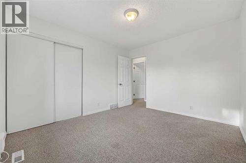 115, 4810 40 Avenue Sw, Calgary, AB - Indoor Photo Showing Other Room