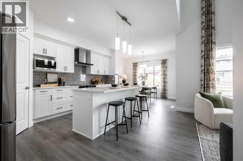21 Sora Gardens Se, Calgary, AB - Indoor Photo Showing Kitchen With Upgraded Kitchen