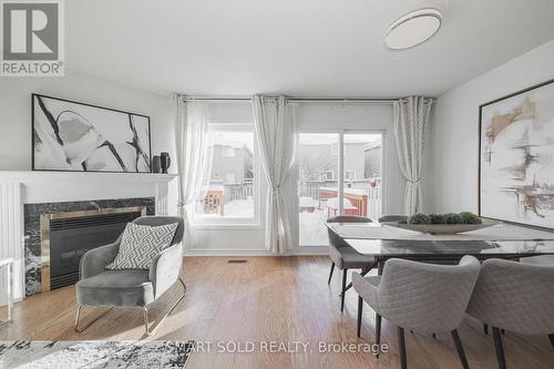29 Breezeway Crescent, Richmond Hill, ON - Indoor Photo Showing Dining Room With Fireplace