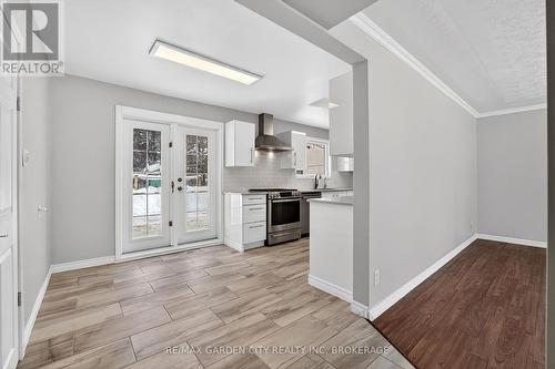 View through foyer to the private back yard - 4864 Michelle Drive, Greater Sudbury (Sudbury), ON - Indoor Photo Showing Kitchen