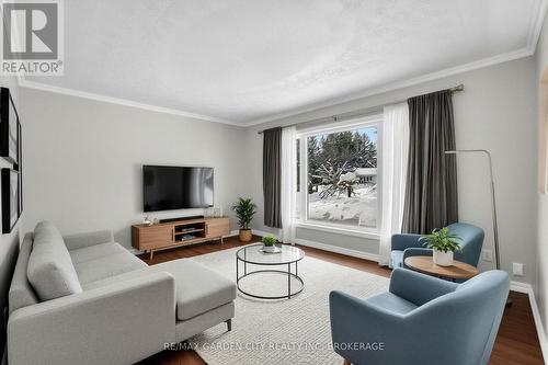 Living room virtually staged - 4864 Michelle Drive, Greater Sudbury (Sudbury), ON - Indoor Photo Showing Living Room