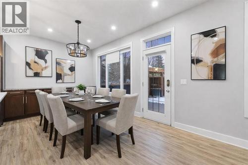 Dining room/breakfast nook conveniently adjacent to the chef’s kitchen (Virtually Staged). - 70 Royal Ridge Manor Nw, Calgary, AB - Indoor Photo Showing Dining Room