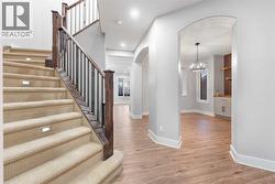 Staircase leading to the upper level. - 