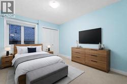 One of four spacious bedrooms on the upper floor (Virtually Staged).. - 