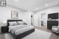 Generously sized fifth bedroom located in the basement. - 