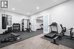 The spacious basement room is suitable for use as a gym or secondary office. - 