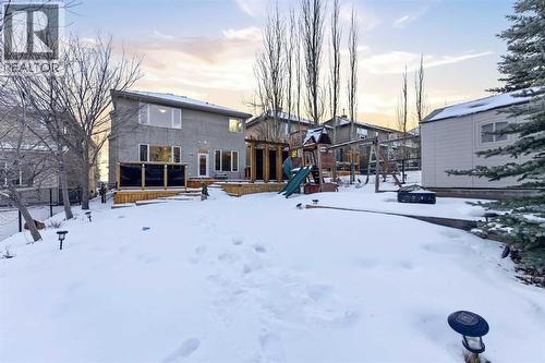 Expansive backyard perfect for BBQs, with play structure included. - 70 Royal Ridge Manor Nw, Calgary, AB - Outdoor