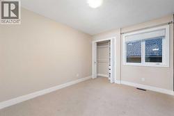 One of four bedrooms on the upper level. - 