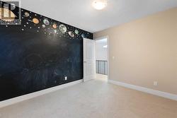 One of four bedrooms on the upper level. - 