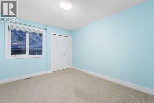 One of four bedrooms on the upper level. - 70 Royal Ridge Manor Nw, Calgary, AB - Indoor Photo Showing Other Room