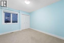 One of four bedrooms on the upper level. - 