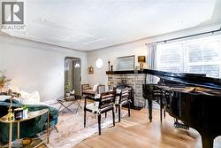 Spacious living room with a cozy wood fireplace - 