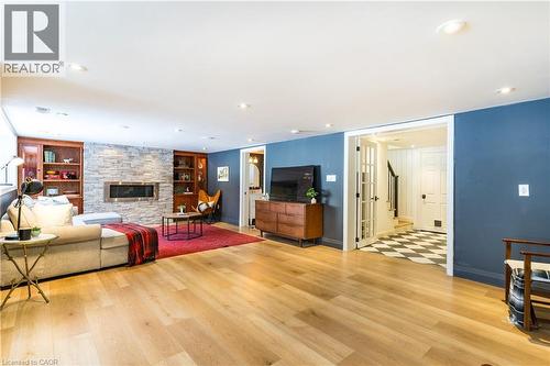 Spacious gas fireplace family room - 3 Fallsview Road, Hamilton, ON - Indoor Photo Showing Living Room With Fireplace