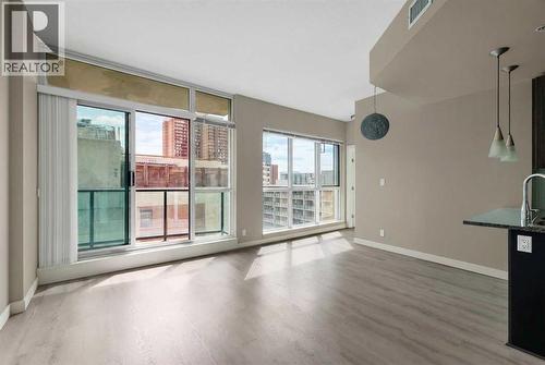Bright and Spacious Living Room and Dining Room - 701, 788 12 Avenue Sw, Calgary, AB - Indoor Photo Showing Other Room
