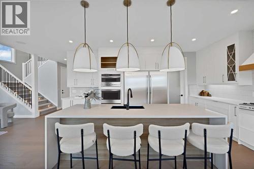 351 Waterford Grove, Chestermere, AB - Indoor Photo Showing Kitchen With Upgraded Kitchen