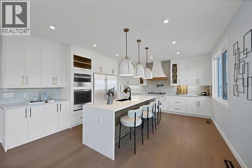 351 Waterford Grove, Chestermere, AB - Indoor Photo Showing Kitchen With Upgraded Kitchen