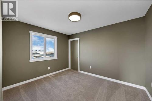 351 Waterford Grove, Chestermere, AB - Indoor Photo Showing Other Room