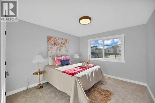 351 Waterford Grove, Chestermere, AB - Indoor Photo Showing Bedroom