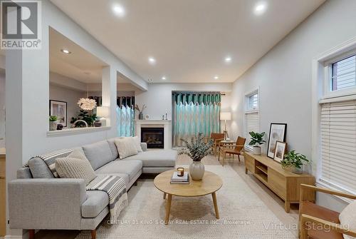 21 - 232 Stonehenge Drive, Hamilton, ON - Indoor Photo Showing Living Room With Fireplace