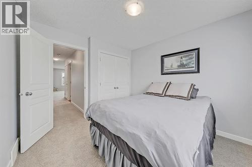 2nd bedroom - 9 Copperleaf Way Se, Calgary, AB - Indoor Photo Showing Bedroom