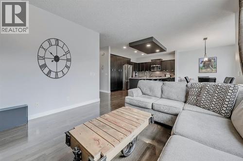 Great space for wall art - 9 Copperleaf Way Se, Calgary, AB - Indoor Photo Showing Living Room