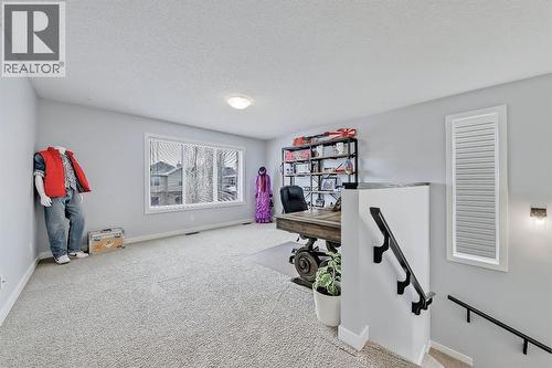 Spacious bonus room - 9 Copperleaf Way Se, Calgary, AB - Indoor Photo Showing Other Room